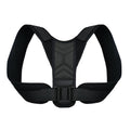Correcteur de posture noir présenté seul, avec bretelles et boucle de réglage.